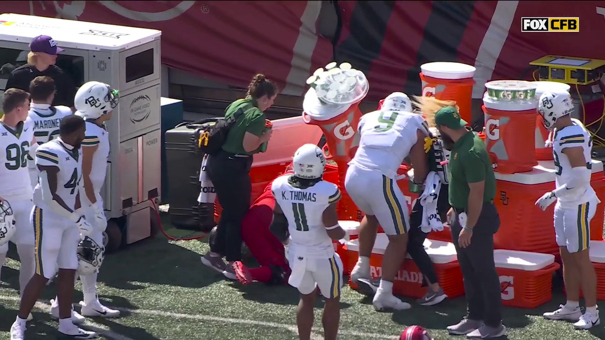 Cam Rising was slow to get up after this collision with the water coolers on the sideline 😬