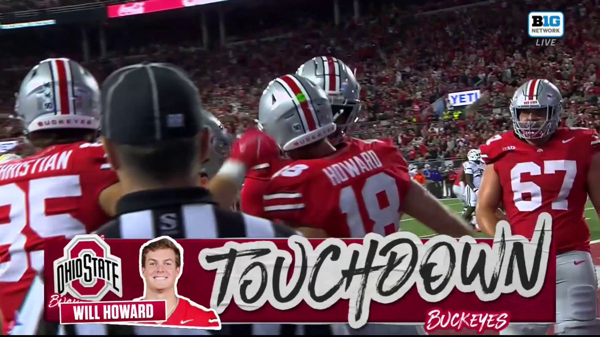 Will Howard hit the O-H celebration after his first rushing touchdown at Ohio State.