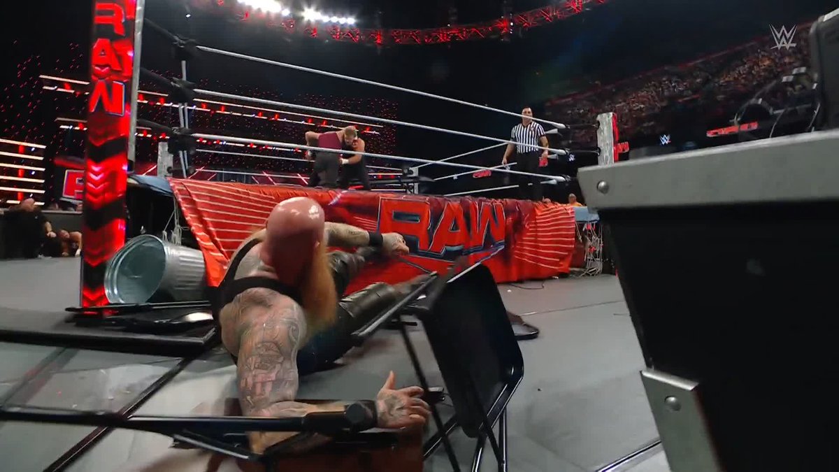 Put 'em through the barricade? 😒 Use the barricade as a weapon? 😏 #WWERaw