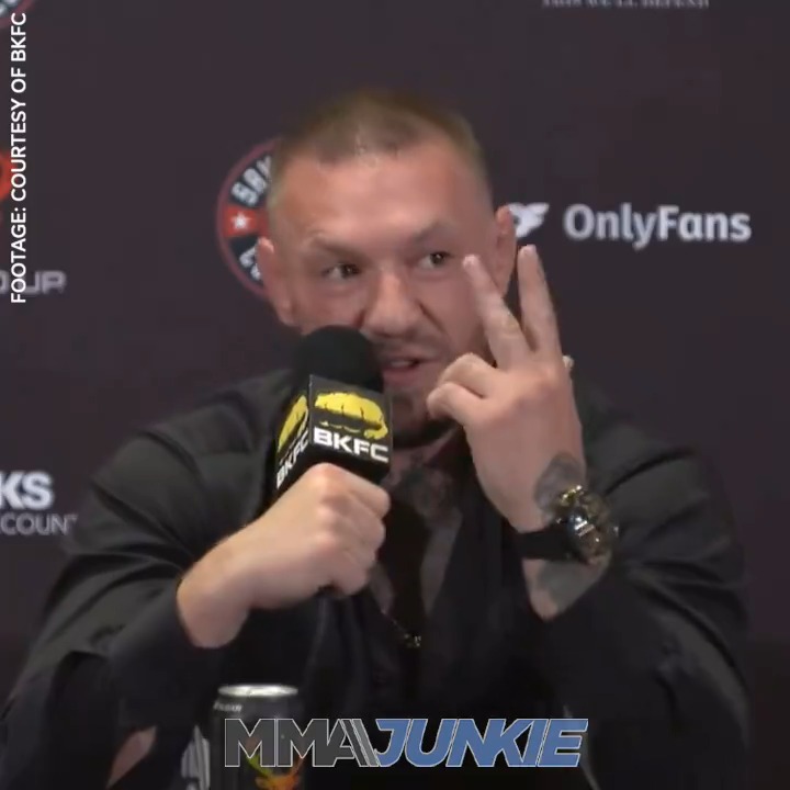 Conor McGregor reacts to Michael Chandler taking a fight vs. Charles Oliveira at UFC 309 and voices frustration booking his UFC return. "I'm out of the loop with it. ... I have two fights left on the contract and it's taking a minute."