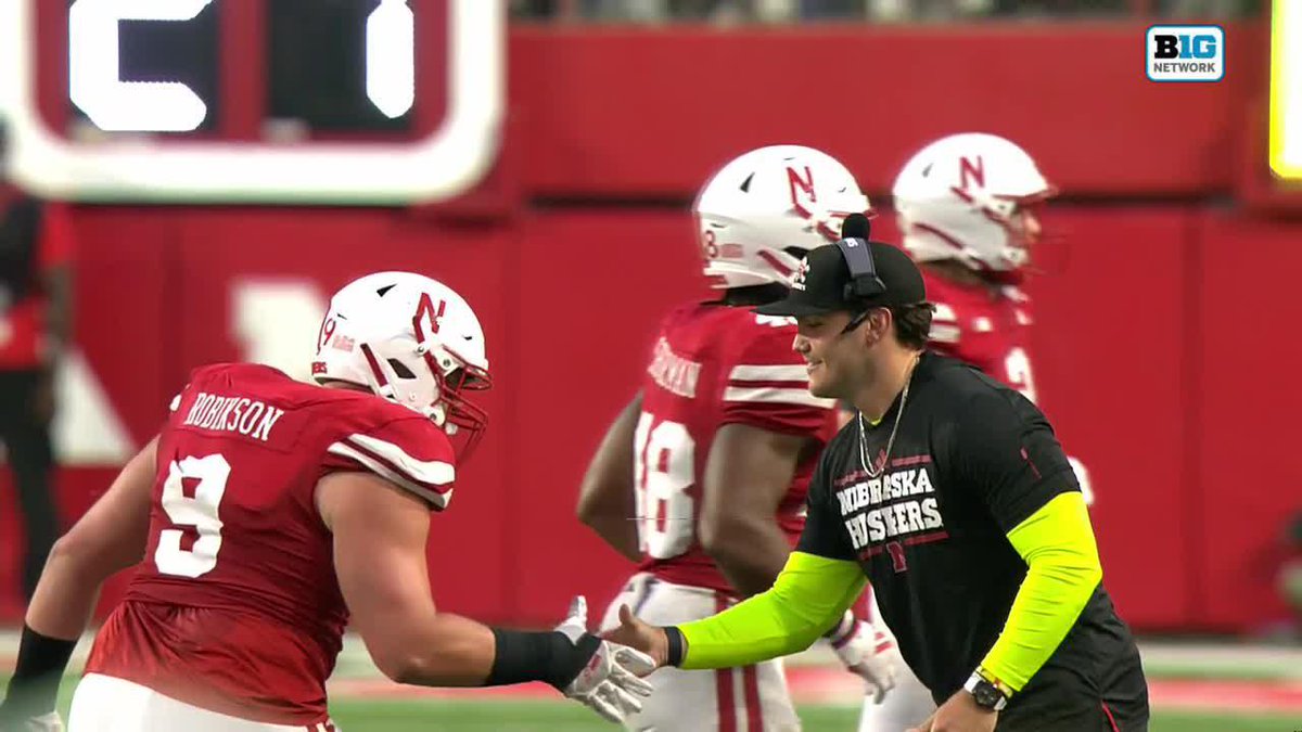 This is so great 😆 One week after a failed sideline celly, Nebraska Football's Ty Robinson and Jack Potenza go with a simple handshake. #B1GFootball