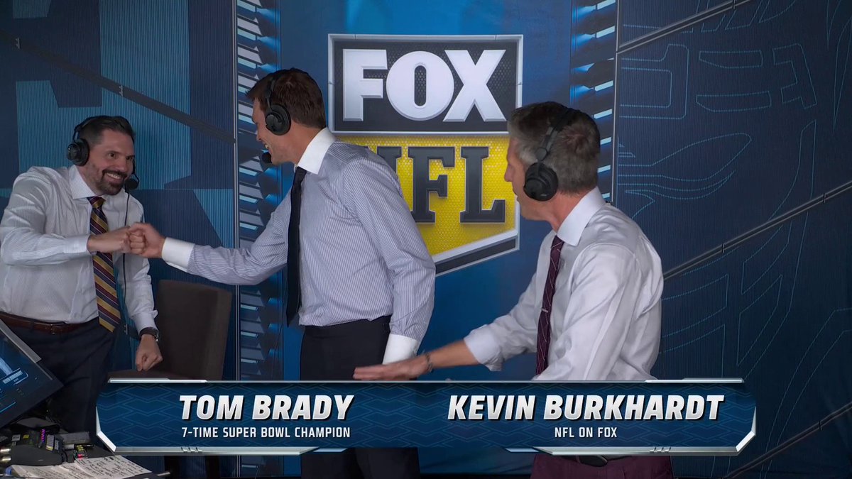 Tom Brady back in the booth! Confident, smiling and getting fist bumps