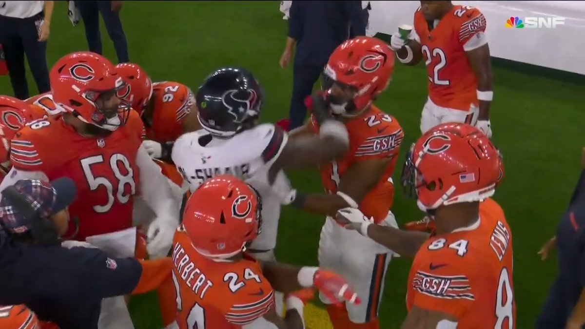 Azeez Al-Shaair threw a right uppercut at Roschon Johnson. No flag.