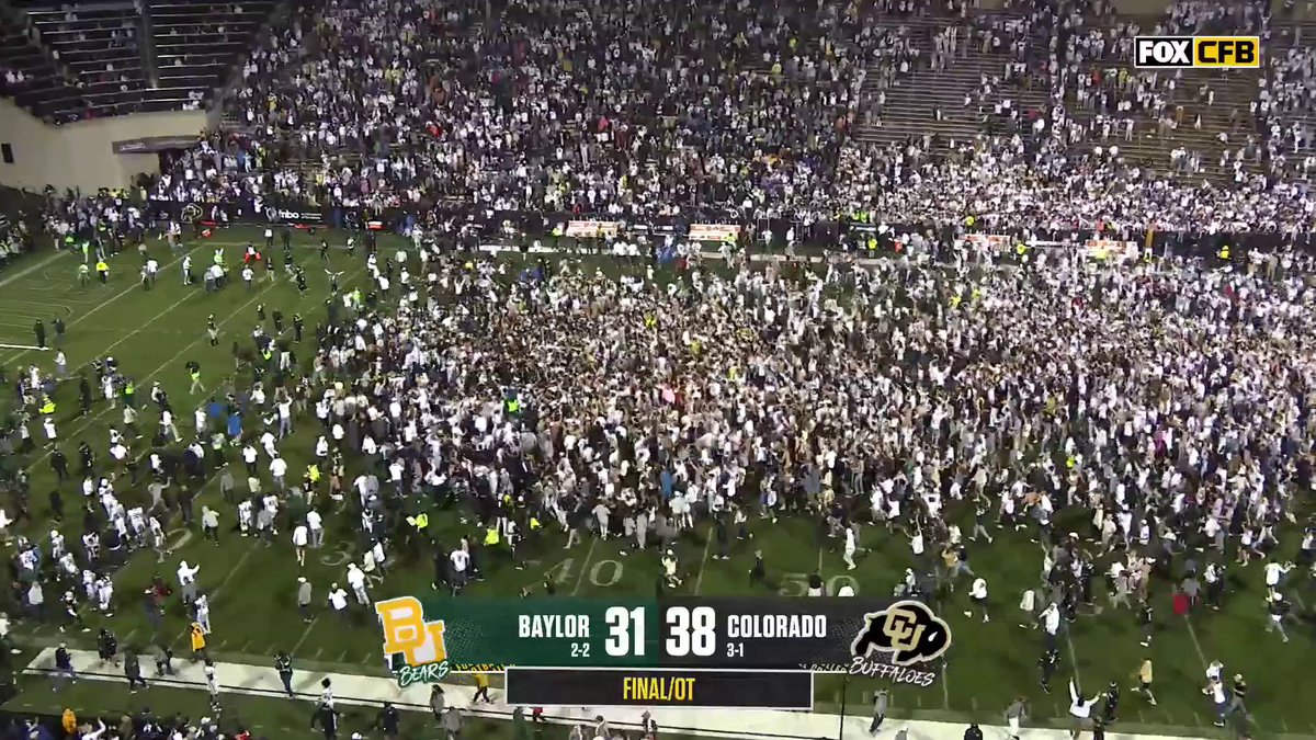 FIELD STORM IN BOULDER COLORADO WINS IT Colorado Buffaloes Football