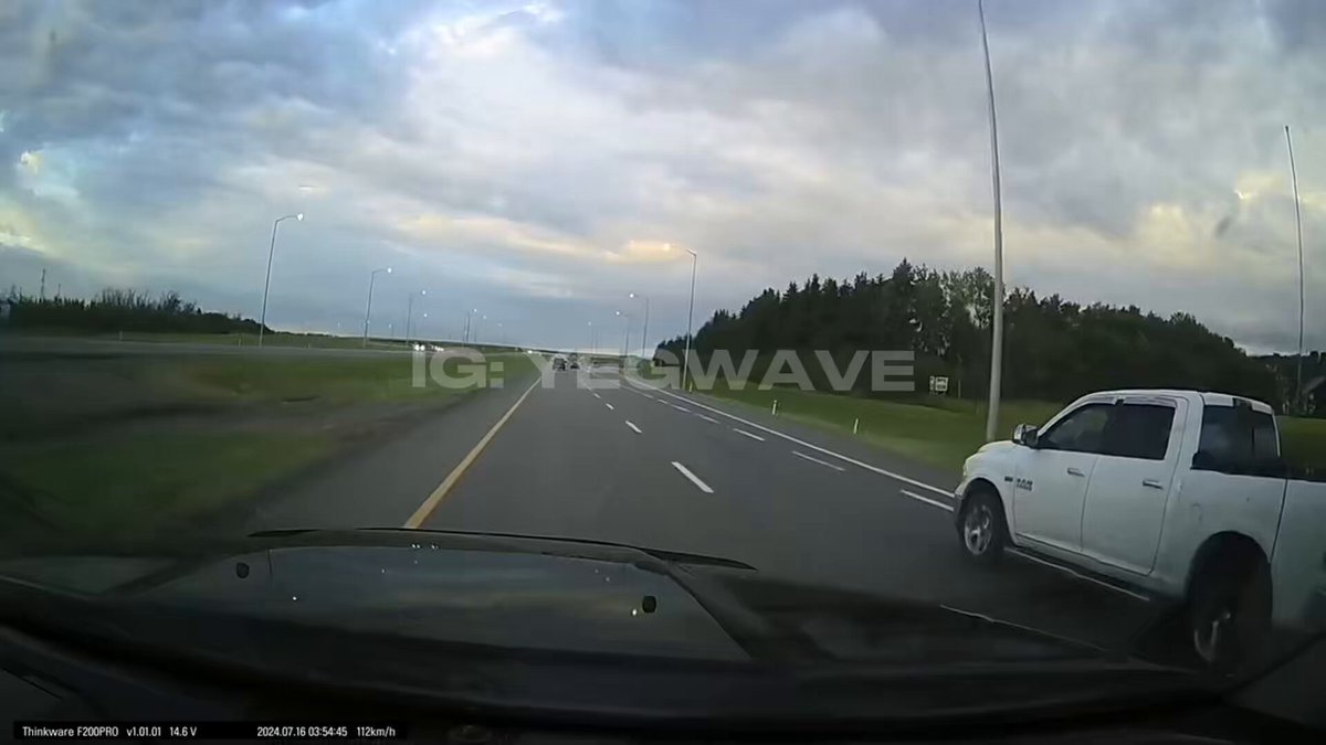 Video shows a pickup truck brake check another vehicle on Highway 21, east of Edmonton, leading to an accident in what appears to be a road rage incident.