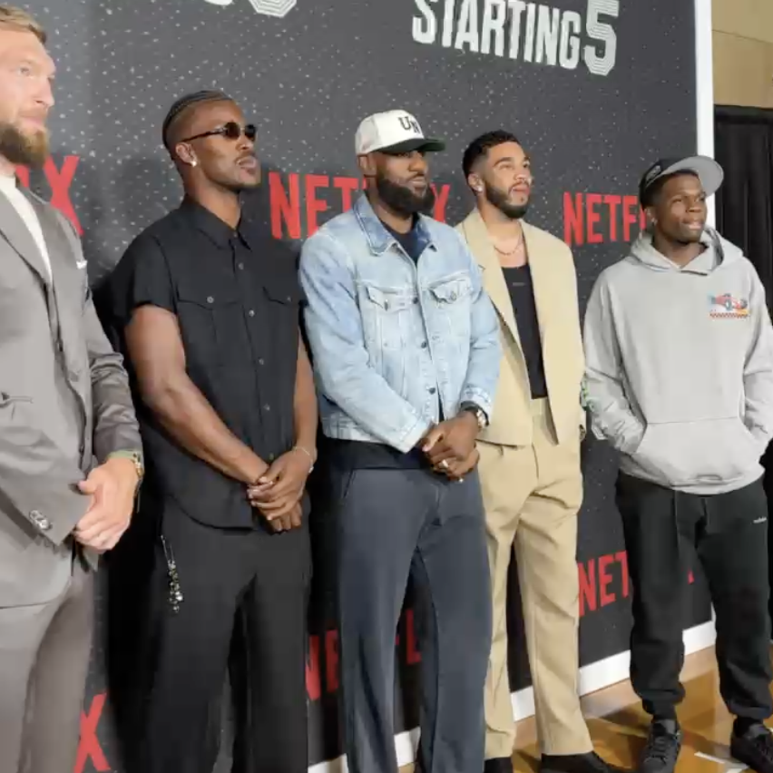 Jimmy Butler, Anthony Edwards, LeBron James, Domantas Sabonis, and Jayson Tatum line up at the Starting 5 premiere. Coming to Netflix October 9.