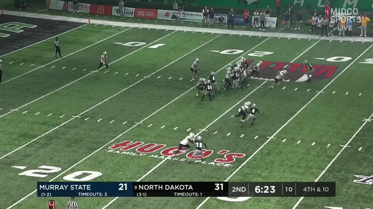 Tyler Erkman gets home and blocks the punt! #UNDproud | #LGH