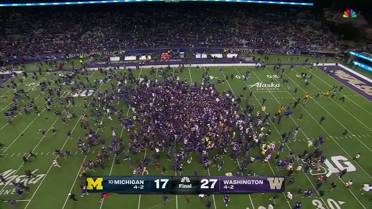 WASHINGTON FANS RUSH THE FIELD Washington Football