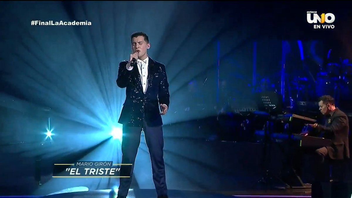 🎶"Hoy quiero saborear mi dolor"🎶 ¡Wow! #MarioGirón se sabe en la final y lo entregó todo con "𝗘𝗟 𝗧𝗥𝗜𝗦𝗧𝗘" de #JoséJosé. 🫶🏼🎵 ¿Arrasará con su performance? ✨👇🏼 #LaAcademia #TeCambiaLaVida #FinalLaAcademia 🔴 EN VIVO ahora: