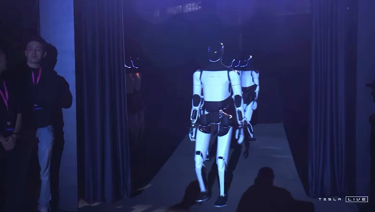 BREAKING: Tesla Optimus bots makes an entry at the We Robot event.