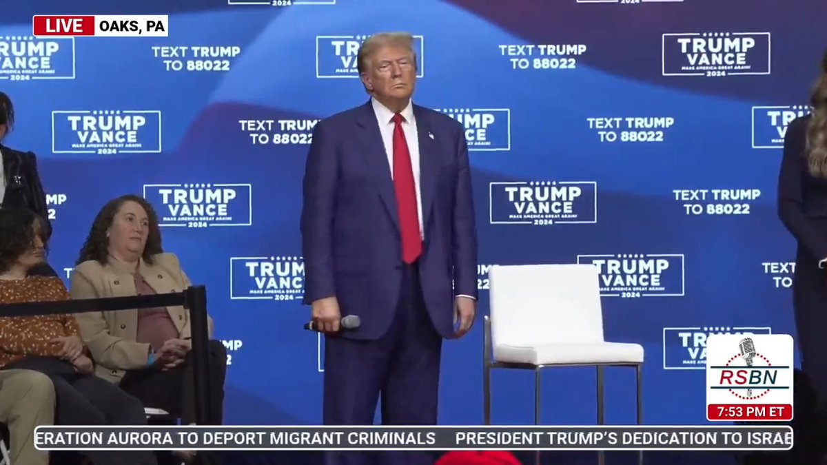 Trump appears lost, confused, and frozen on stage as multiple songs play for 30+ minutes and the crowd pours out of the venue early