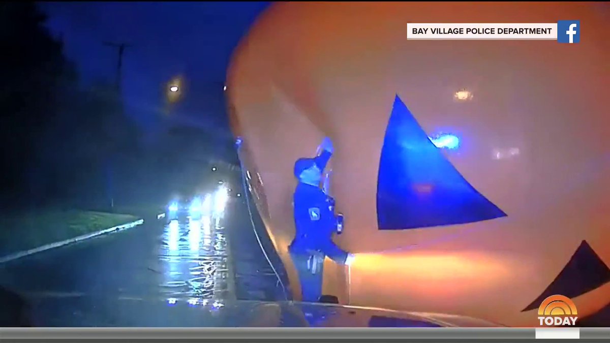 Dashcam video shows an Ohio police officer arriving on the scene where a massive runaway inflatable pumpkin was completely blocking a road. As he tried to remove it, the pumpkin swallowed him whole. Eventually the officer broke free and the pumpkin was returned to its homeowner.
