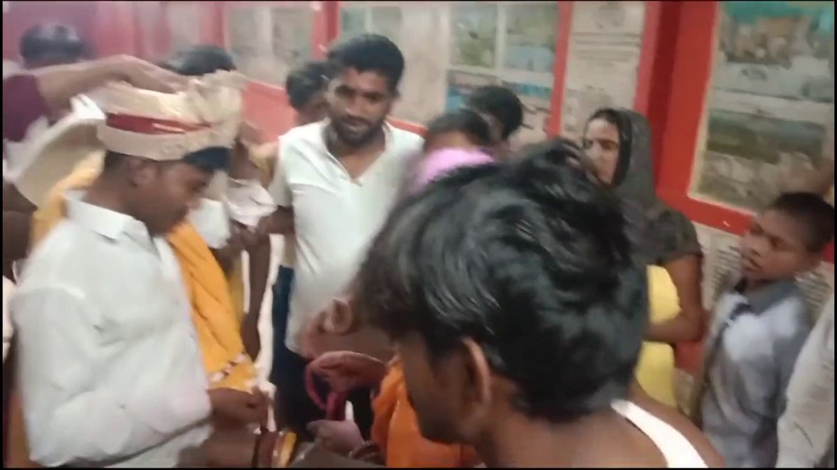 Forced marriage in Samastipur, Bihar - The boy is a railway employee - The girl is unemployed - The girl's family kidnapped the boy and forced him to marry her - Look how sad he is - That unemployed girl is so happy and laughing