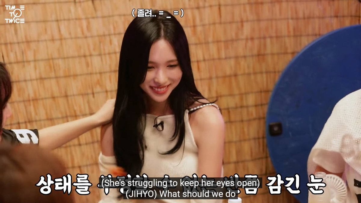 Mina struggling to keep her eyes open and almost dozing off after just one drink 😭