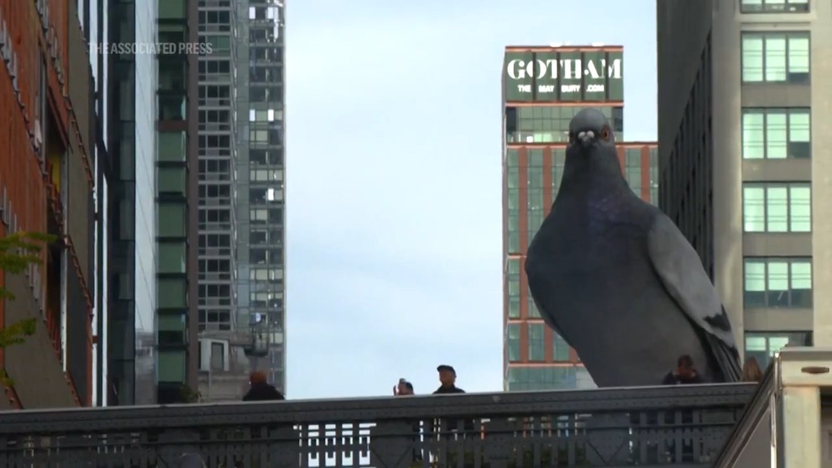 Visitors are flocking to New York City's famed High Line to see its latest art installation, a 16-foot-tall pigeon sculpture that has the city in a flutter.