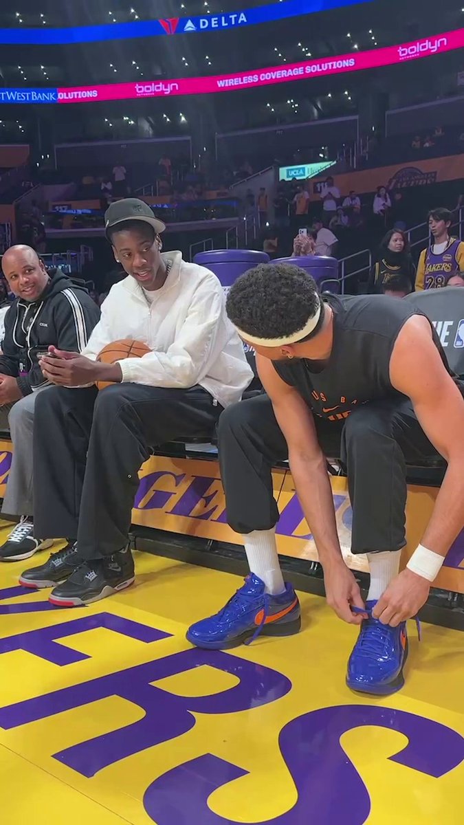 AJ Dybantsa, the No. 1 ranked basketball recruit on ESPN's 2025 list, taking it all in courtside at Suns-Lakers 🤝