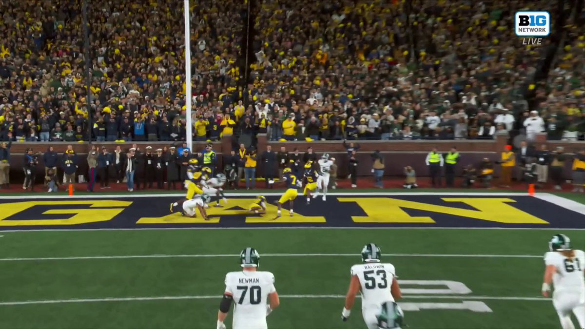A fight breaks out after Michigan takes the knee to seal the win vs Michigan State 😳