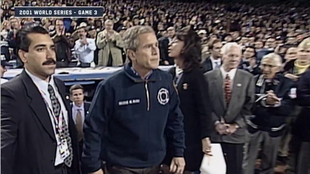 President George W. Bush gives Derek Jeter advice before he throws out the first pitch in Game 3.