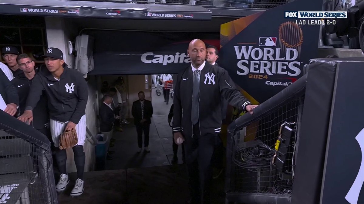 Derek Jeter’s first pitch before Game 3 of the World Series