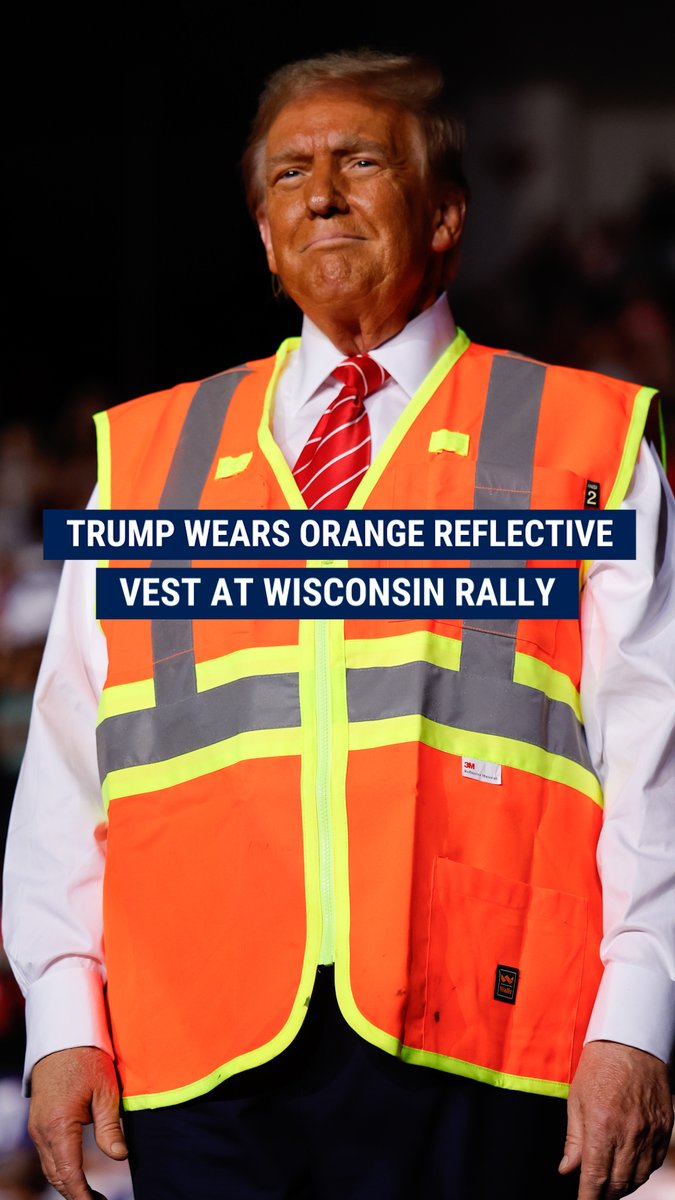 CLEANUP DUTY: Trump speaks at a rally in Green Bay, Wisconsin, wearing an orange reflective vest after rolling up in a garbage truck as Biden comes under fire for calling MAGA supporters "garbage."