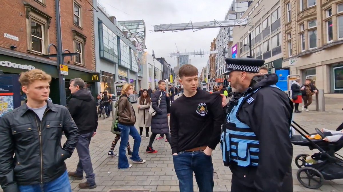 The same cop, at the same place, has a different way of dealing with bad words in these two situations.