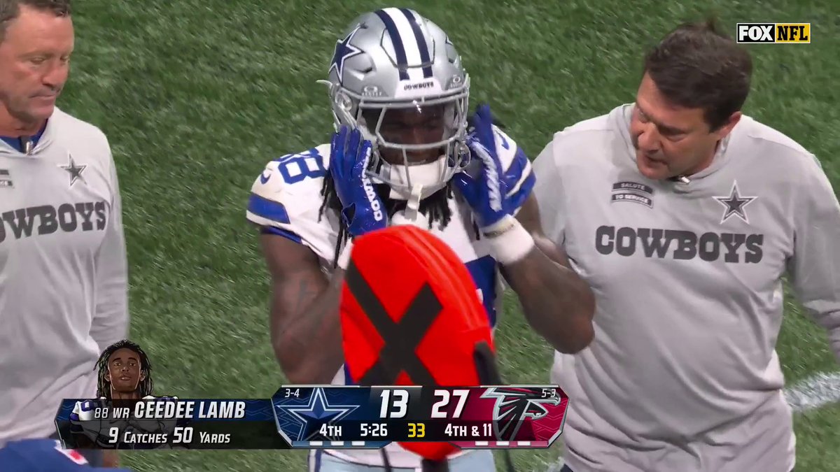 CeeDee Lamb was slow to get up after this play.