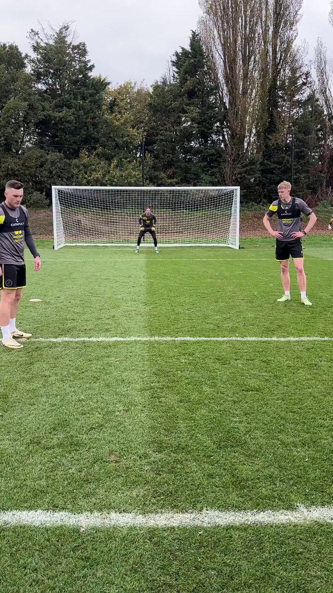 I enjoyed watching this simple activity set up by Millwall manager, Neil Harris for his players… These kinds of stripped back activities are important for players to practice during a long season of successes and failures…ups and downs… Where can Mr. Harris take these? 👇🏻 He can slowly start to crank up the fidelity of the activity. What does ‘fidelity’ mean. Simply, he can start to make the activity look more like the game…incorporating more and more information sources that players will be faced with in the actual game. This can be important because fidelity promotes transfer of learning (players are more likely to transfer their practice into the game). For example, a defender can be added. At first, this defender can be asked to defend lightly - at 50%. Then to defend a little more vigorously - at 75%. From here, another defender can be added (and defenders can be given specific instructions in order to tailor the practice of the forwards). Mr. Harris could also add in some randomness. For example, he could give his wide players opportunities to practice a varied array of crosses…in this way the forward players would receive different types of deliveries which they’d be challenged to cope with. All the while, Mr. Harris could facilitate the session - he could ask the forward players to find different solutions to problems posed (by the defenders) which can spark useful coaching conversations between reps. When Mr. Harris does some of the above, he’s engaging in several coaching processes involved in learning: 1. Scaffolding: to support player learning 2. Variability: each rep is different due to the unique variation experienced in the game 3. Randomness: each rep is uncertain…meaning players have to really focus and process the experience (increasing learning) 4. Coach behaviour - asking questions, offering suggestions, providing choice, explicit instruction Players benefit from an array of experiences - they enjoy simple activities and more complicated ones. They enjoy being overtly instructed and brainstorming problems themselves…