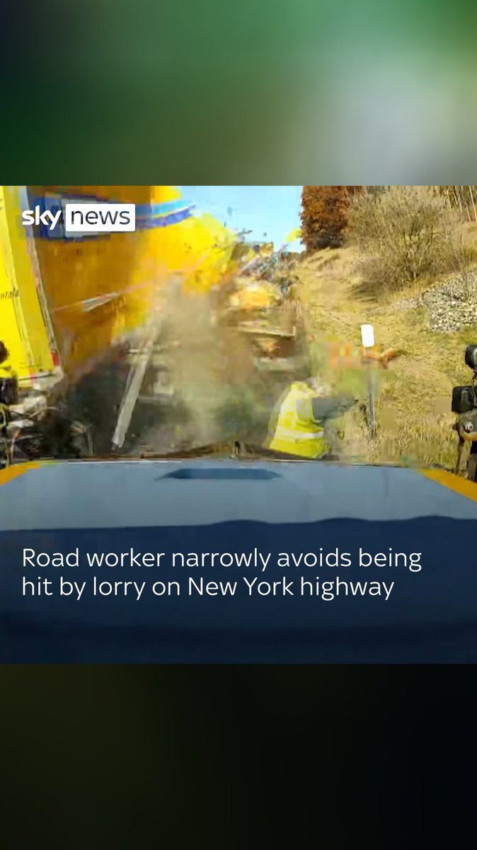 This is the moment a road worker narrowly missed being hit by a lorry on a highway in upstate New York 🚛
