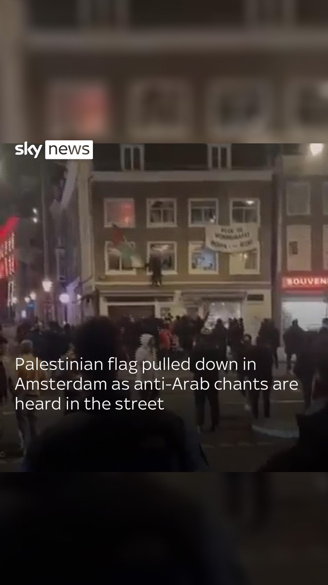 Video has emerged of a crowd swearing and chanting anti-Arab slogans in Amsterdam amid a 'violent incident' in which Israeli football fans were targeted.