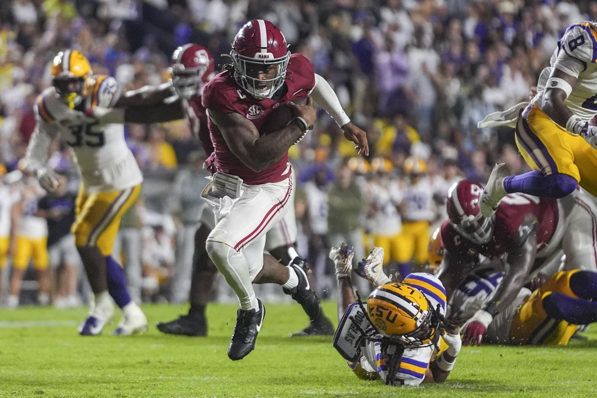 Alabama's Jalen Milroe is AP National Player of the Week for Week 11, rushing 12 times for 185 yards and 4 TDs in a 42-13 win over LSU. His 16 rushing TDs set a school season record, surpassing Jalen Hurts.