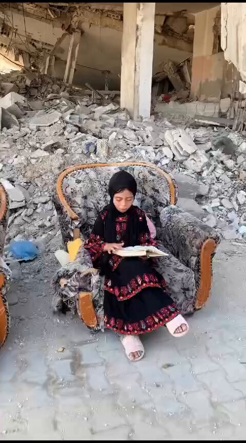 This little Palestinian girl is trying her best to learn reading alone, as education in Gaza has been on halt for more than a year due to the Israeli genocide.