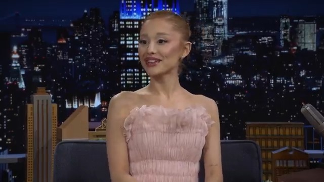 Ariana Grande shows a behind the scenes look at her first time doing the chandelier stunt in “Popular”