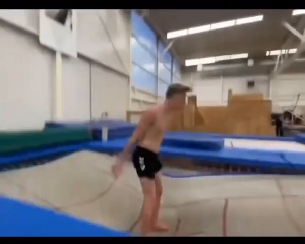 Dudes spine folds in half on trampoline