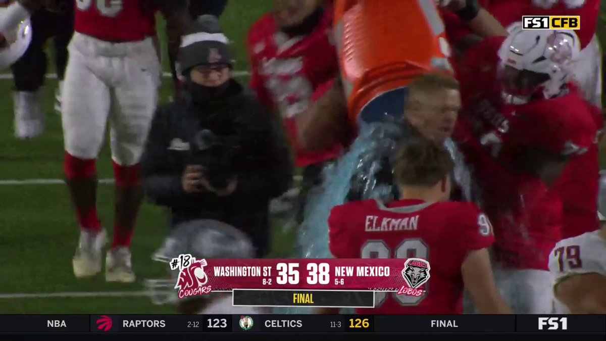 Bronco Mendenhall gets a Gatorade shower after the Lobos take down Washington State 🙌