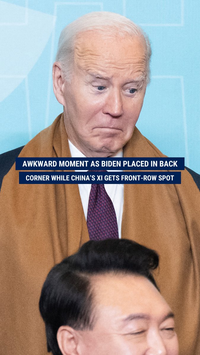 WATCH: Biden takes a back seat to other world leaders during an international trip, relegated to a corner spot in the traditional family photo of the world's most powerful figures, while China's president takes the prominent front-and-center position.