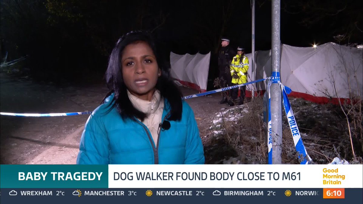 A police investigation has been launched after a dog walker found the remains of a baby in a field in Salford. Greater Manchester Police said it is too early to tell the baby's ethnicity or gender.