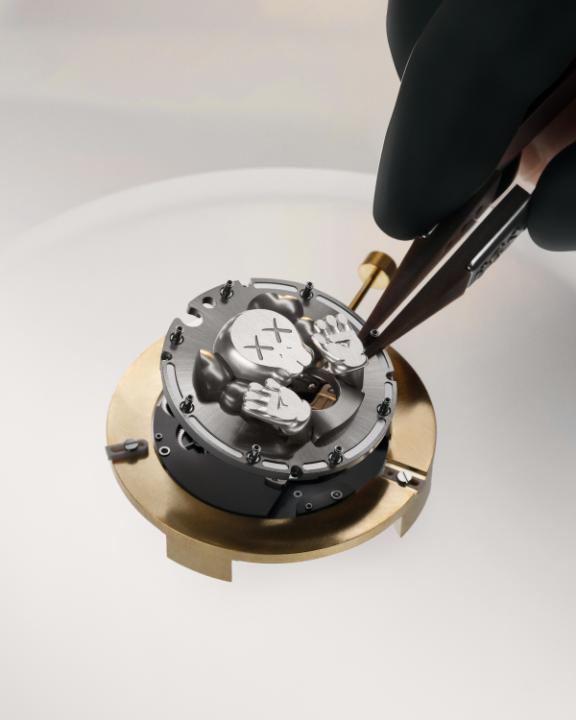 The 43mm Royal Oak Concept Tourbillon "COMPANION" features KAWS' 3D character with a skull head and X eyes, powered by the Calibre 2979 movement, with a tourbillon at its heart, merging art and precision. #APxKAWS