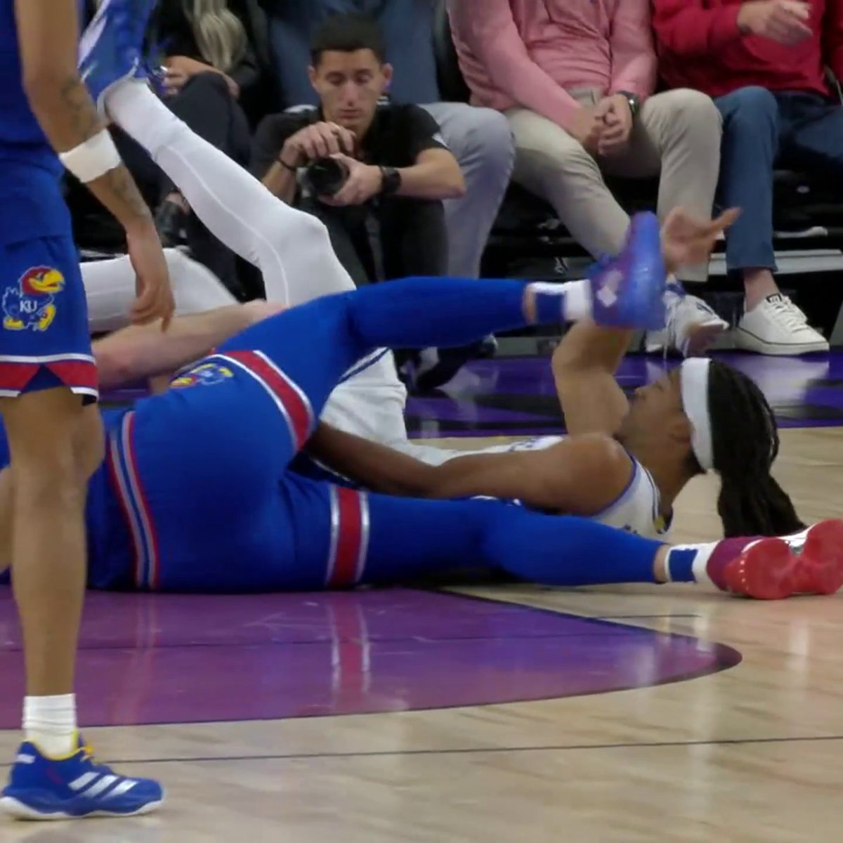 Hunter Dickinson was ejected after being assessed a flagrant 2 foul for kicking Maliq Brown.