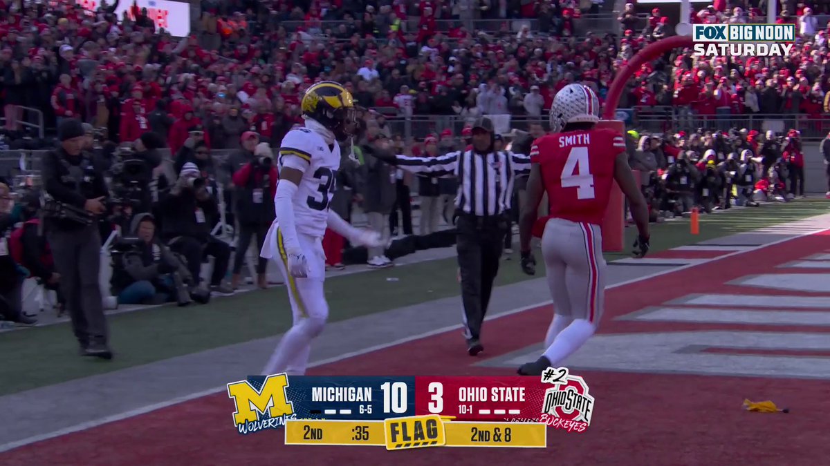 First flag he drew was an uncalled facemask on him. Second is straight up OPI. The defender does not need to get out of his way so he can catch the ball.