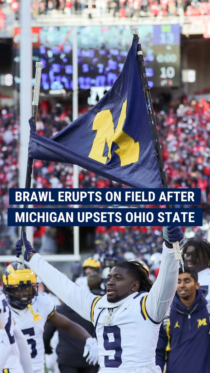 TURF WAR: Michigan's upset over Ohio State erupted into chaos after a player planted a Michigan flag at midfield following the Buckeyes' shocking defeat.