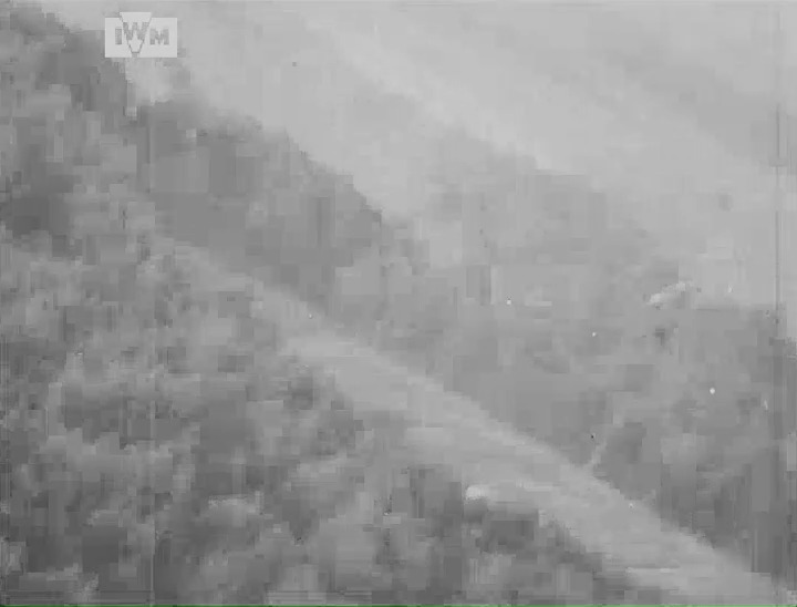 A Hawker Tempest pursues a Luftwaffe Arado Ar 96 near Fassberg airfield in Germany, striking its wing with its 20mm cannon, 9 April 1945. Film: IWM CBS 55