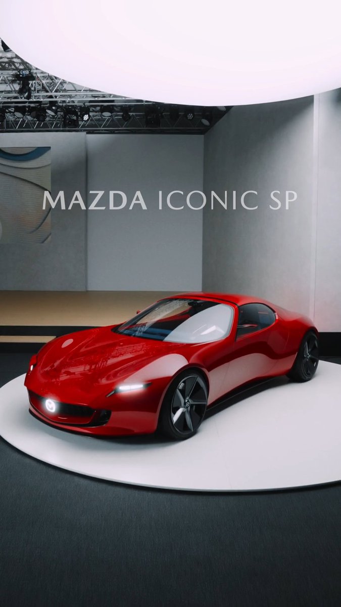 At the 2023 Japan Mobility Show, the Mazda Iconic SP made headlines with its head-turning silhouette and innovative hybrid powertrain. #Mazda #Craftedinjapan #JapanMobilityShow #IconicSP