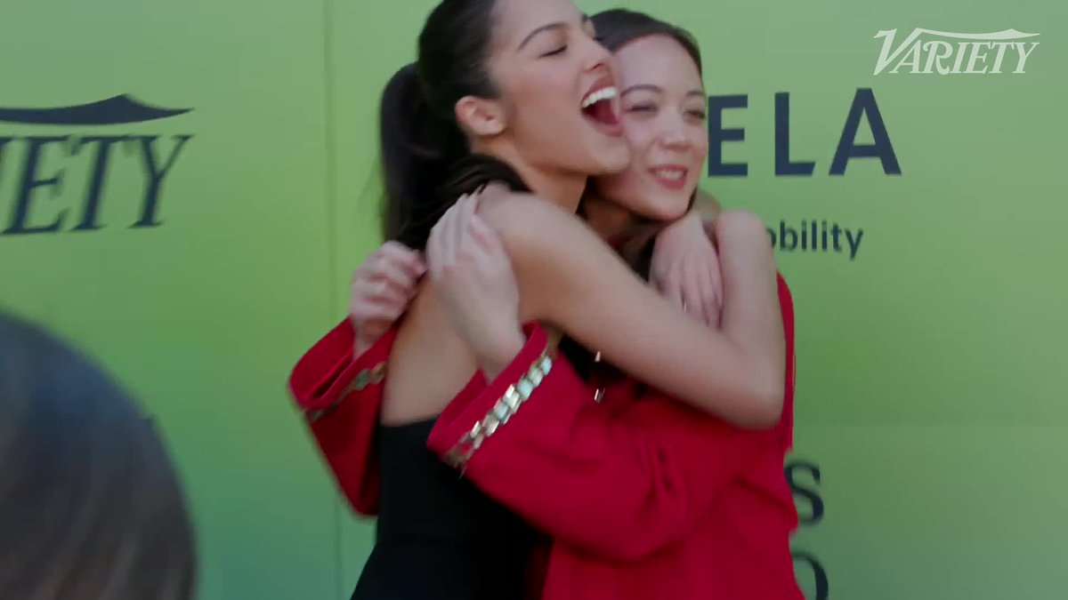 Olivia Rodrigo and Laufey hug on the carpet at Variety Hitmakers presented by AFEELA.