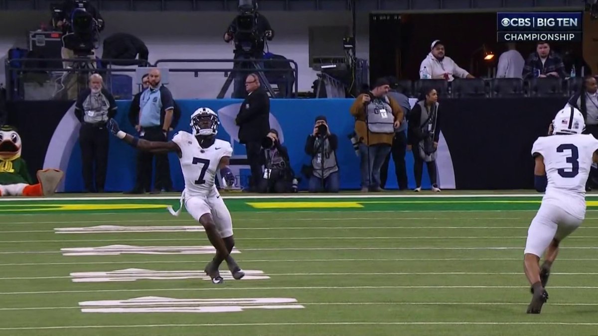 Fair catch or no? After discussion, a fair catch is ruled with the ball coming back to where it was caught.