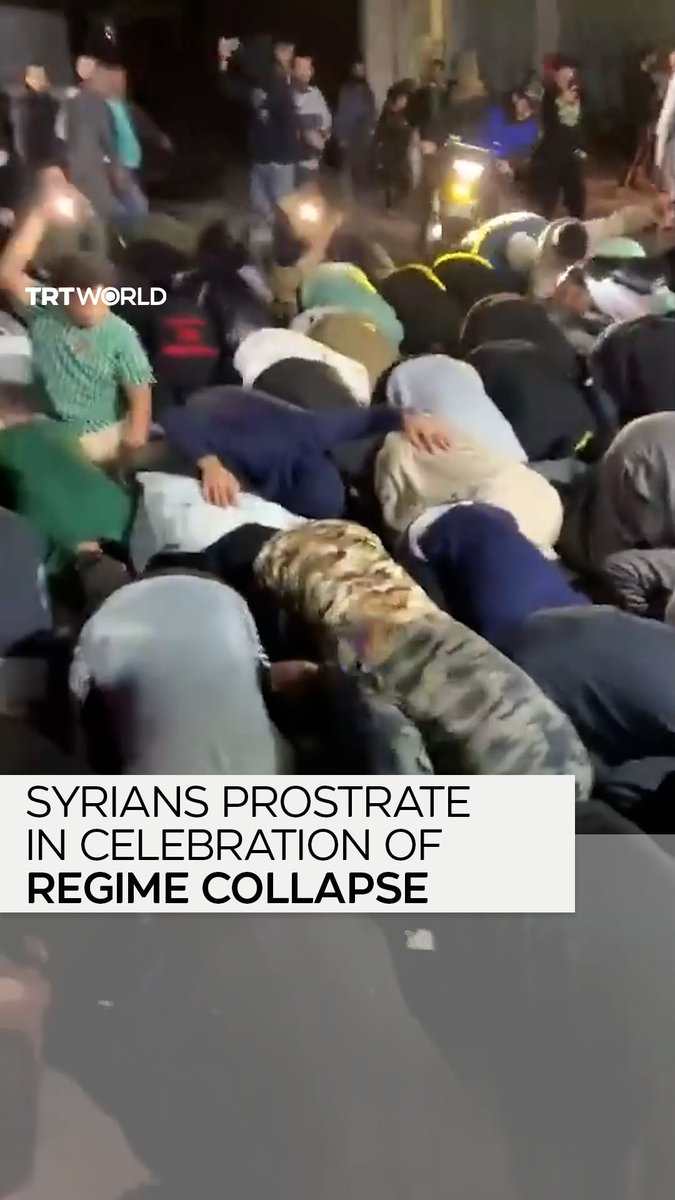 Syrians prostrate in celebration of the collapse of Bashar al Assad’s regime after opposition forces entered the capital Damascus