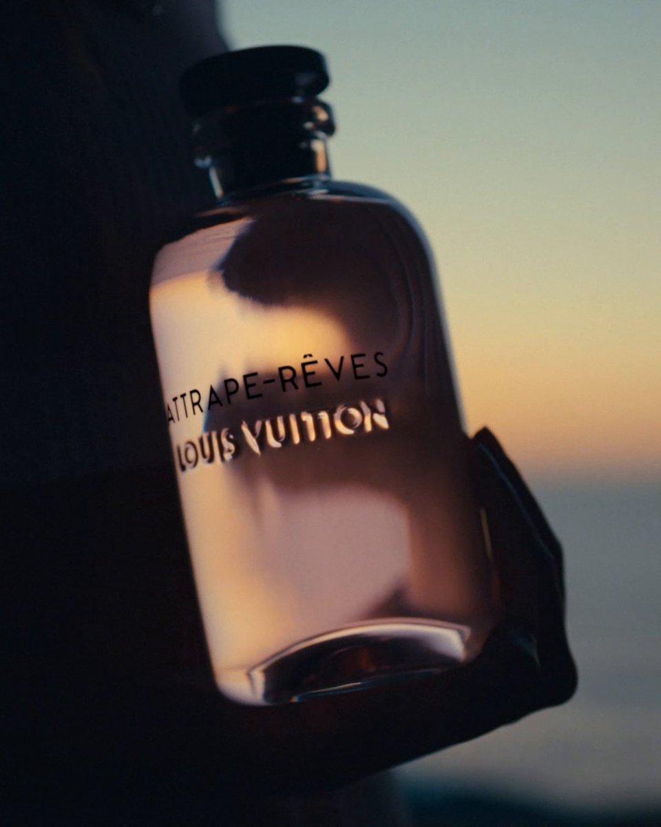 Attrape-Rêves. Imagined by Master Perfumer Jacques Cavallier Belletrud, this signature Louis Vuitton perfume embodies the daring, invigorating journey of transforming dreams into reality. Discover the iconic fragrance at #LVParfums #LouisVuitton