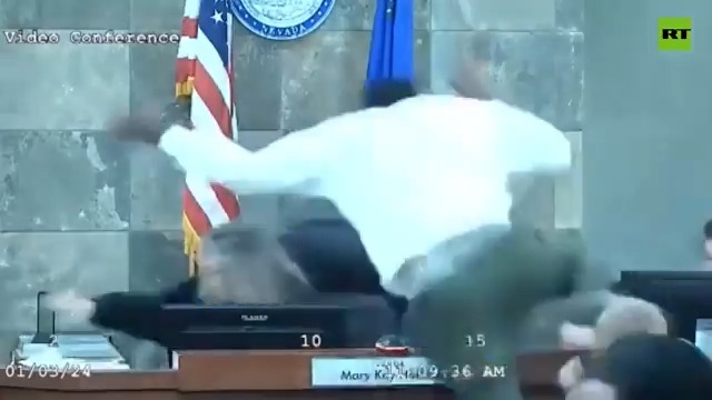 Man who leaped over a courtroom bench and assaulted District Court Judge Mary Kay Holthus during a sentencing hearing earlier this year has been sentenced to 26 years in prison