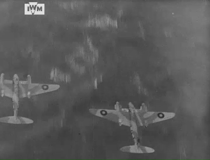 Mosquitoes filmed flying low over water and countryside during a day raid, 1942. Film: IWM ARY 17-23 <1/2>