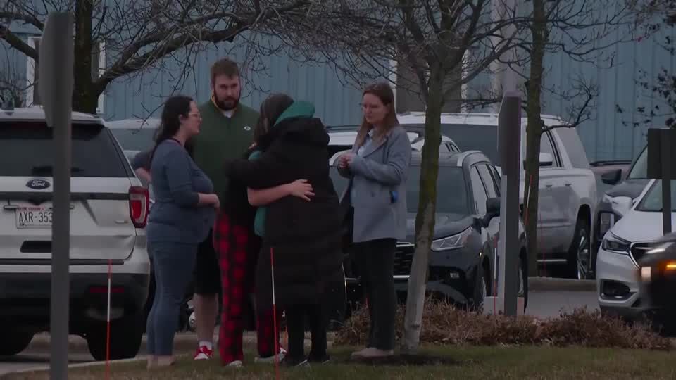 A teenage shooter opened fire at a Wisconsin school, killing a fellow student and a teacher and wounding six other people before police found the suspect dead at the scene