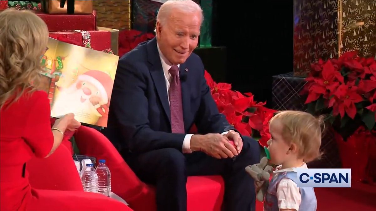 President Biden interacts with a child at Children's National Hospital.